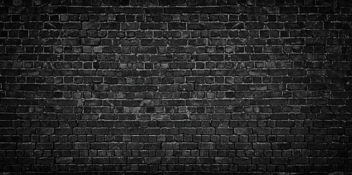 dark brick wall as a backdrop. brickwork design element