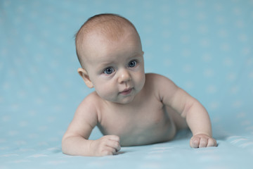 Cute happy baby girl crawling 