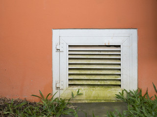 service door on the orange wall