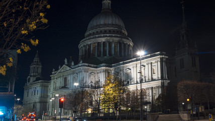 St Pauls Cathedral with cars and red bus passing, LONDON, ENGLAND, long exposure