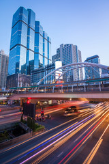 Chong Nonsi Station pedestrain walk path located in Bangkok Downtown, cityscape with long exposure effect during sunset