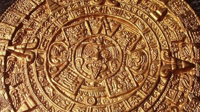 golden image of aztec sun circle rotating new quality historic native footage