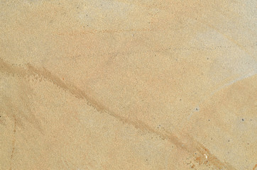 Light yellow color smooth stone surface as a background