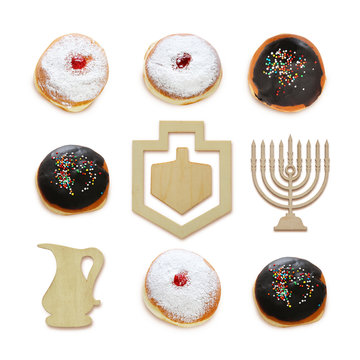 jewish holiday Hanukkah image with traditional doughnuts and menorah (traditional candelabra) isolated on white.