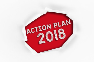 Torn paper with a PLANNING 2017 word on red background.