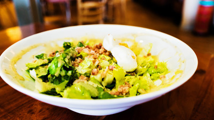 Traditional cesar salad with boiled eggs