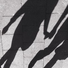 Shadow Couple Holding Hands