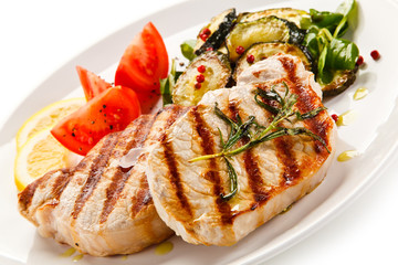 Grilled steaks and vegetables