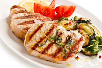 Grilled steaks and vegetables