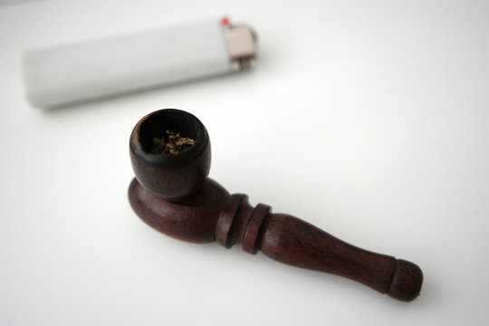 A pipe with marijuana for recreational smoking
