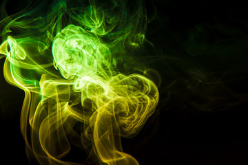 Colored smoke on black background