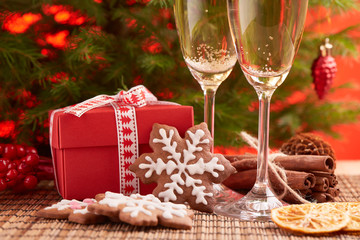 Champagne and gift. New year and Christmas.