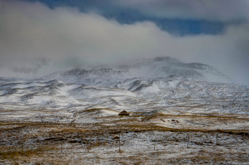 Winter in the mountains. Christmas landscape on a sunny morning.