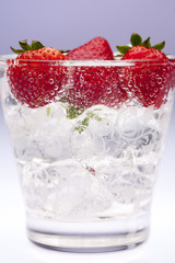 strawberries in soda and ice