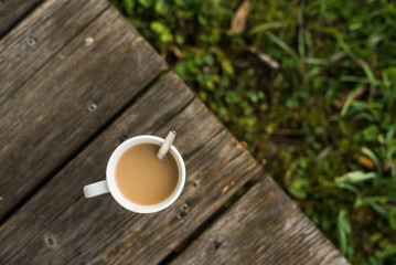 A hot cup of coffee on a cold morning