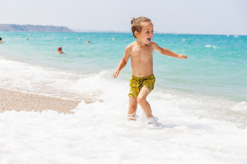 Beautiful boy and the sea