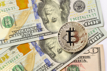 Silver bitcoin on dollar background