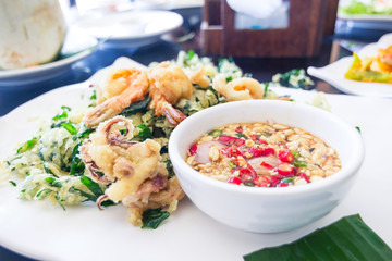 Fried shrimp and squid with herb.