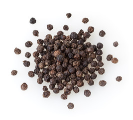 Heap of black pepper corns isolated on white background