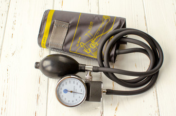 Apparatus for measuring on white wooden background