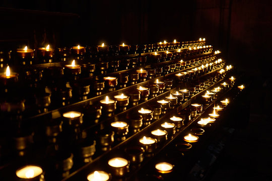 Meditation candles in a church / Candles in Freiburg Minster