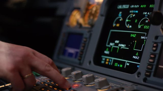 Panel of switches on an aircraft flight deck. Autopilot control element of an airliner. Pilot controls the aircraft. Onboard computer, cockpit