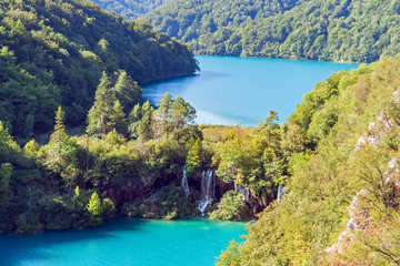 Obraz premium Waterfalls in Plitvice National Park - Croatia. Plitvice Lakes National Park is one of the oldest and the largest national park in Croatia. In 1979, it was added to the UNESCO World Heritage register.