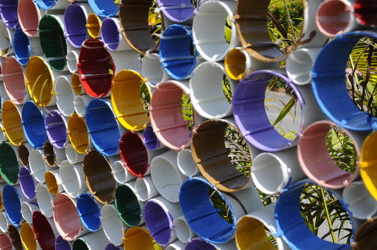 Unplasticized polyvinyl chloride or uPVC pipes bonded together and painted colorful.
