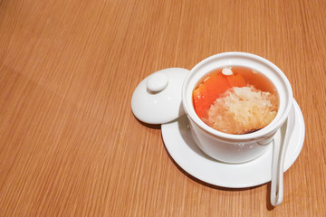 Traditional Chinese sweet dessert of fungus papaya for well-being health