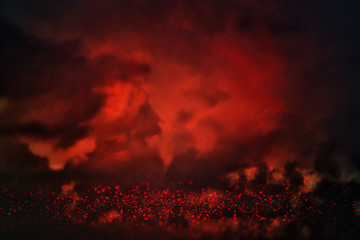 black and red glitter lights background. defocused