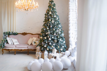 Christmas background. Interior room decorated in xmas style. No people. New year tree and gifts
