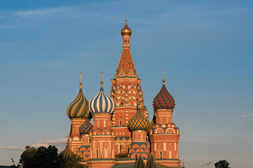 Fototapeta na wymiar St. Basil's Cathedral on Red Square in Moscow and nobody around one autumn morning. Blue sky