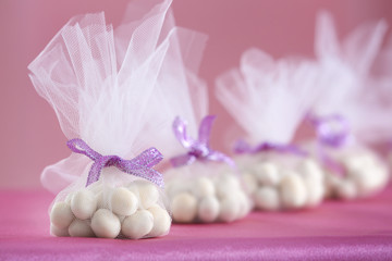 Candy favors for baby shower on table