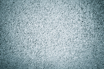 concrete wall texture with fine sand detail on the wall with vignette effect. abstract background.
