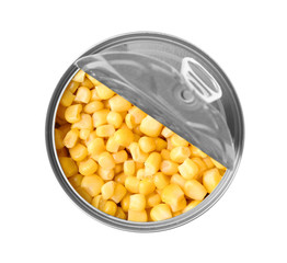 Open tin can with corn kernels on white background