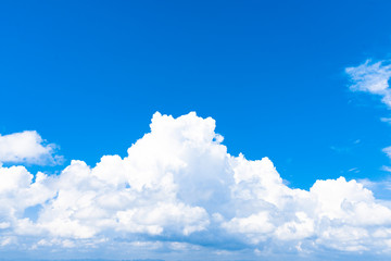Naklejka na ściany i meble White cloud and blue sky background image.