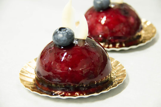   blueberry mousse dessert devorated with fresh blueberry