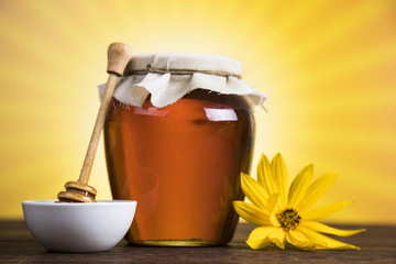Fresh honey on wooden table