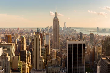 Fototapete New York Manhattan Midtown Skyline mit beleuchteten Wolkenkratzern bei Sonnenuntergang. NYC, USA