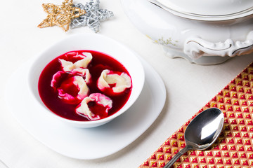 Red borsch with dumplings, traditional Polish Christmas Eve dish