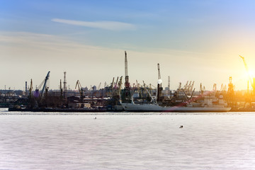 Fototapeta premium View from the Gulf of Finland covered with ice on St. Petersburg seaport. Russia..