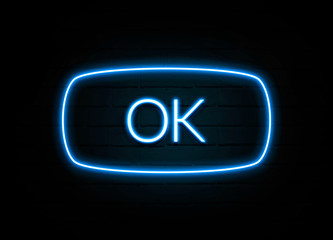 Ok  - colorful Neon Sign on brickwall