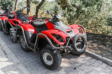 ATV offroad quad bikes parked alone at the road