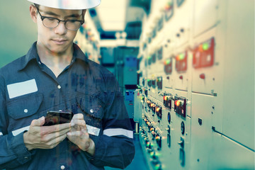 Double exposure of  Engineer or Technician man using smart phone for control electric in switch...