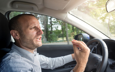 Angry Italian driver gesturing funny, road rage theme