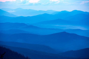 Obraz premium blue misty valley in mountains