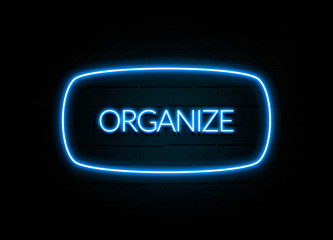 Organize  - colorful Neon Sign on brickwall