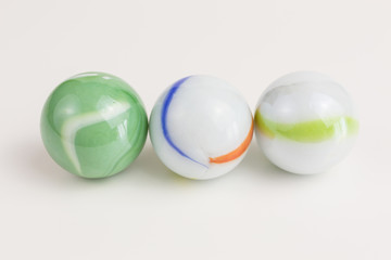 glass marbles in green and white