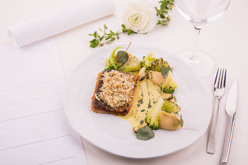 The Black Sea mullet with cabbage, young potato, leek, is served in sour cream sauce with fennel