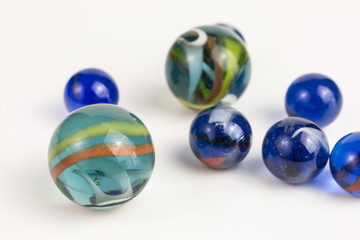 group of glass marbles in blue